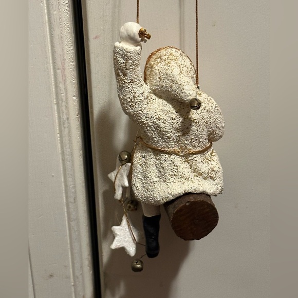 Wild western Santa hangs from gold thread with stars and bells. - Picture 4 of 8